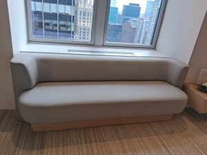 The challenge: A beautifully crafted custom banquette that doesn't fit the space.
